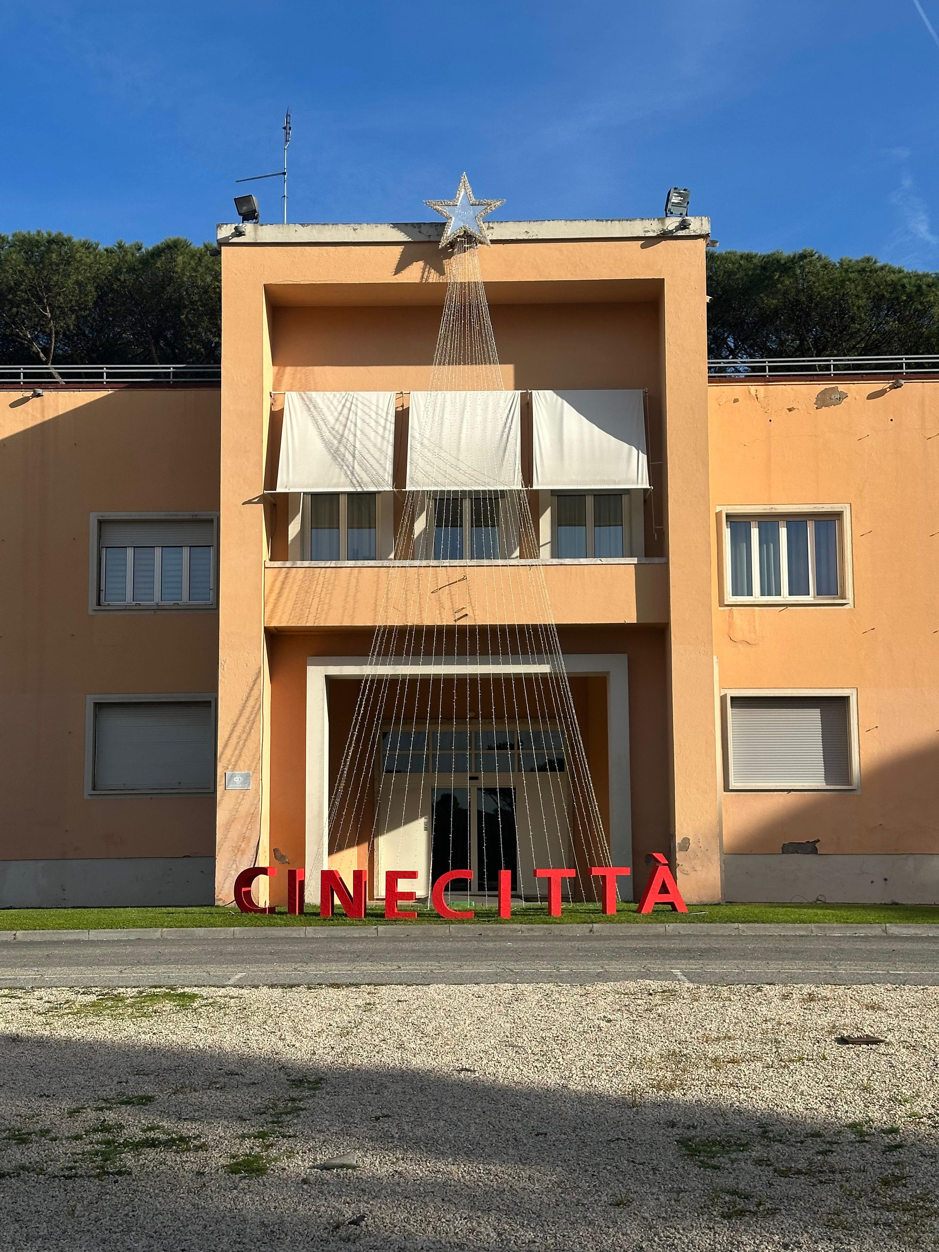 The entrance building of the Cinecittà studios in Rome