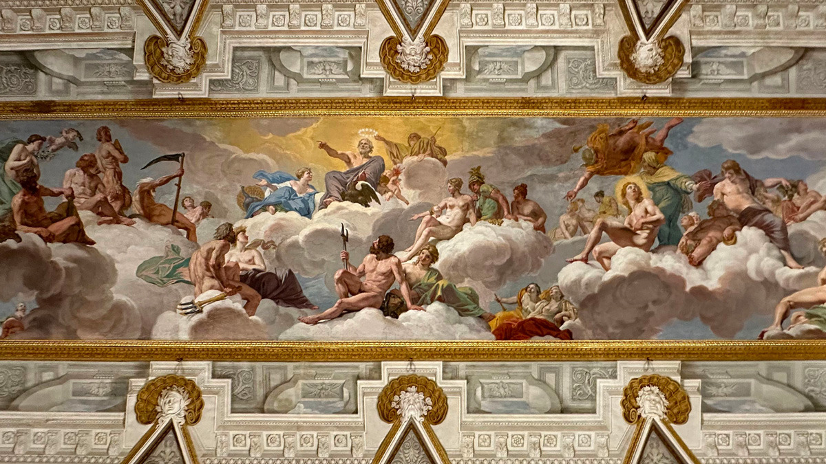 Frescoed ceiling with gods amid clouds, framed in gilded stucco, in the Borghese Gallery