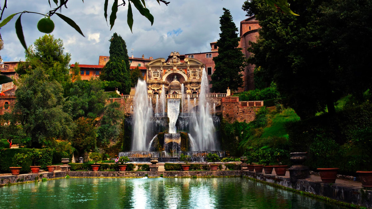 Grand fountain with rising jets and a long pool in a lush Renaissance garden