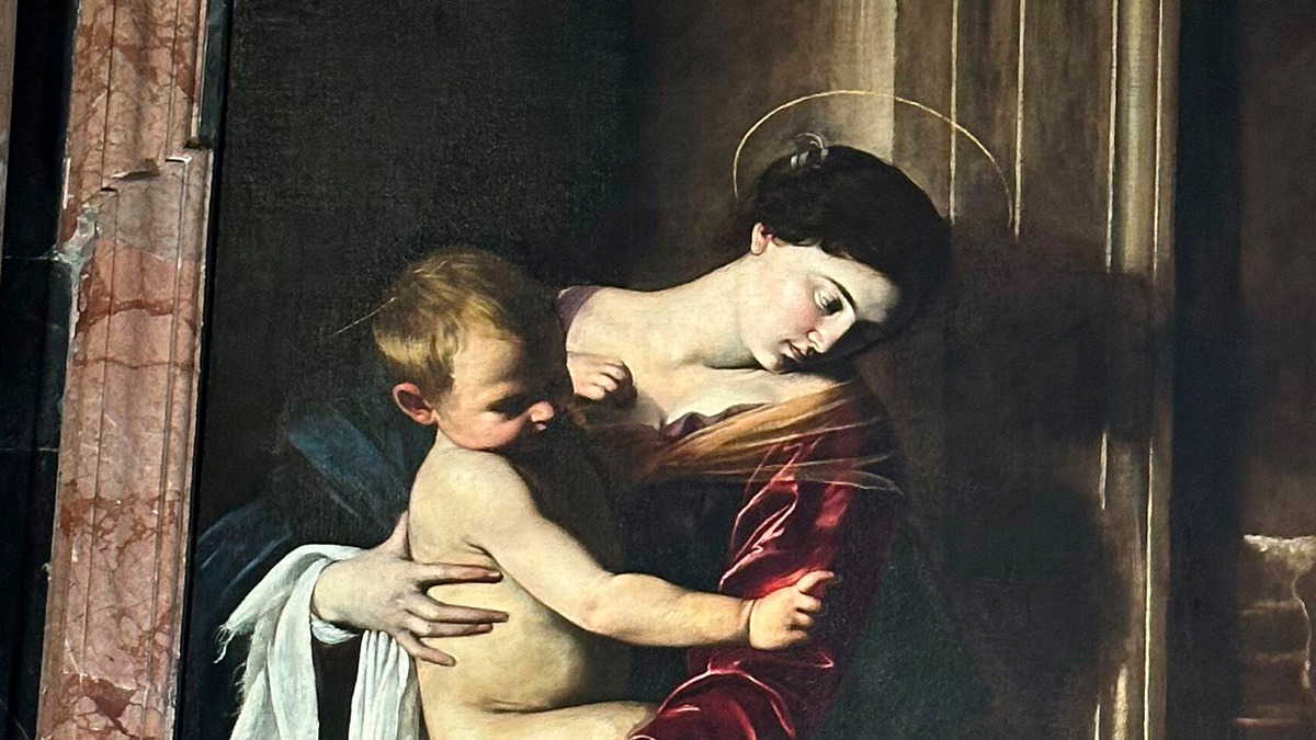 Caravaggio's Madonna of Loreto showing the Virgin holding the Christ child in a haloed, shadowy composition