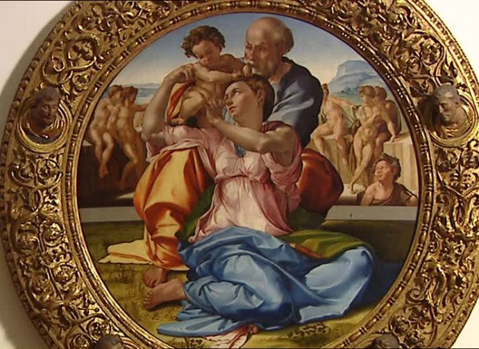 Close-up of Michelangelo's Doni Tondo, the Holy Family in an ornate gilded circular frame