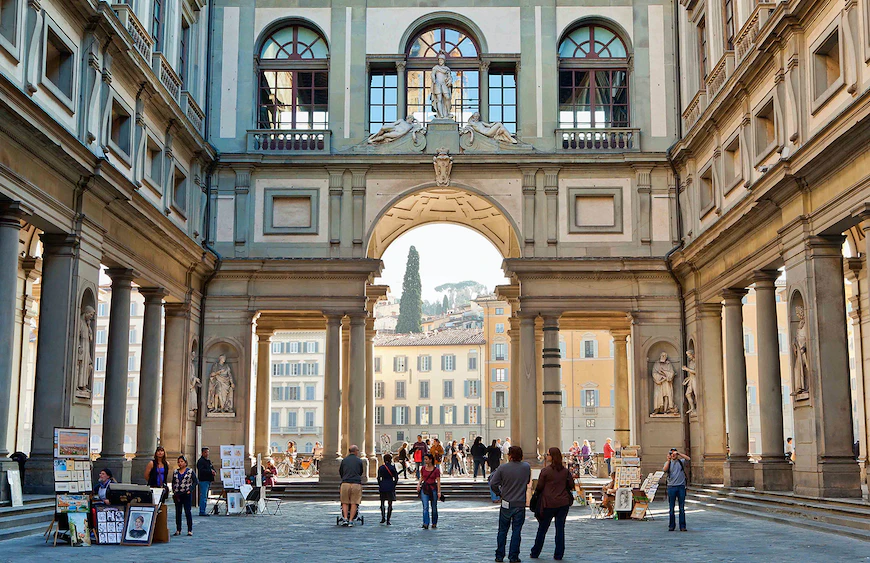 Uffizi Gallery courtyard with its arched loggia framing the view toward the Arno