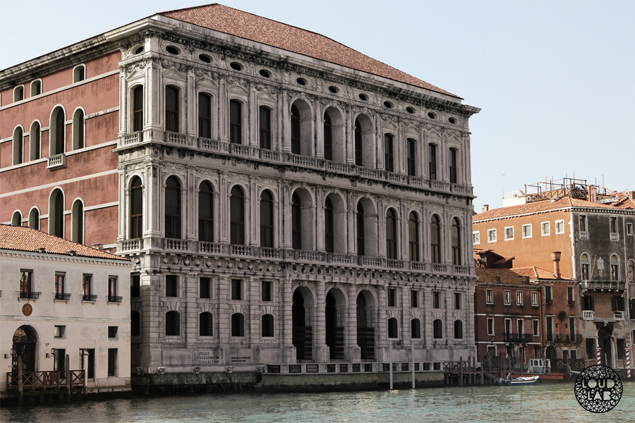 Grand Canal palace with a rusticated ground floor and tiers of arched windows