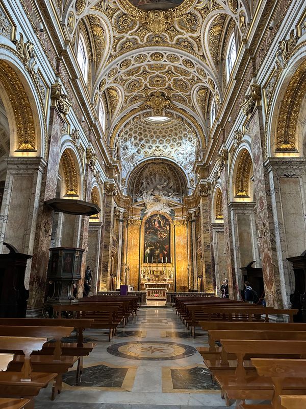 Gilded coffered ceiling and nave of the church of San Luigi dei Francesi in Rome