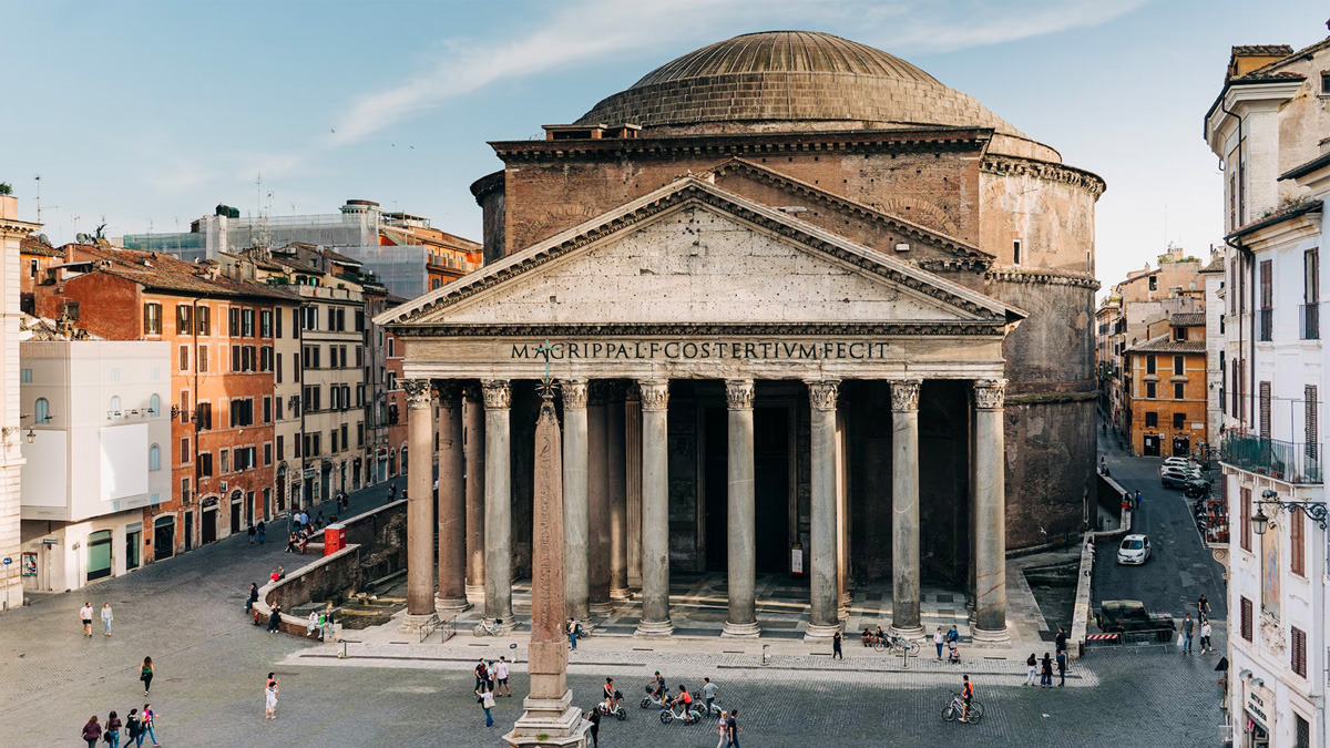 Pantheon facade and portico with its obelisk fountain, seen from above across the busy square