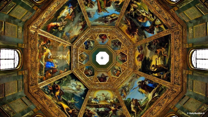 Frescoed octagonal dome with gilded ribs seen from below in the Medici Chapels